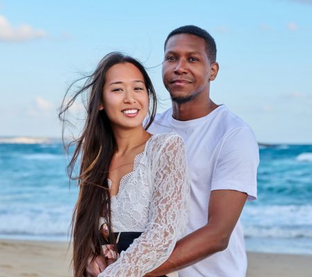 Beautiful young couple in love on the beach