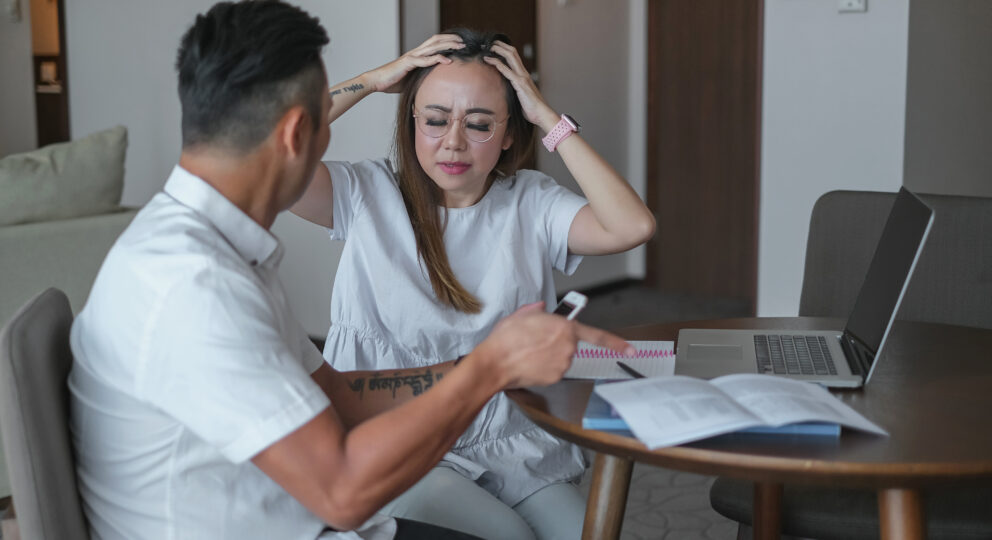 Couple having conflict conversation about money